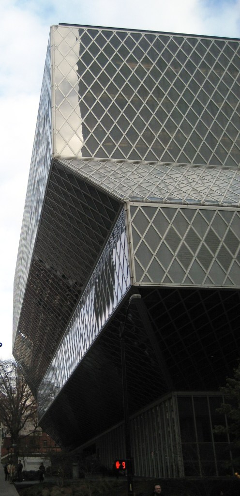 The Seattle Public Library main branch - a multi-windowed/glass exterior made to look like a stack of books