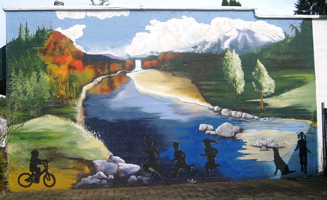 A valley scene with Snoqualmie Falls running into the Snoqualmie River (center), reflections of mountains and trees on one side, Mount Tahoma on the other. In black shadows, children of all ages at play.